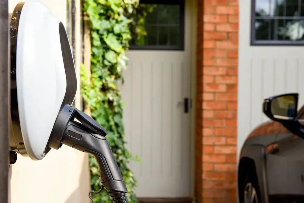 Home EV wallbox charger installed on a domestic garage wall with a dedicated circuit