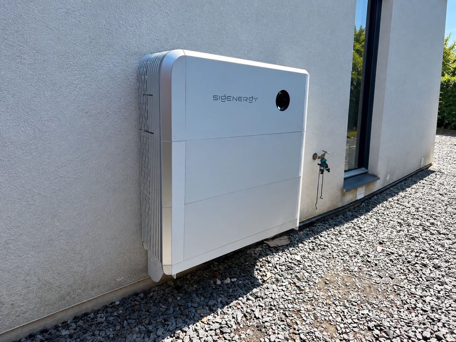 Sigenergy battery storage unit mounted on an external house wall